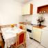 Apartmani Draskovic, Apartman sa 2 spavace sobe, privatni smeštaj u mestu Petrovac, Crna Gora - Kuhinja 1